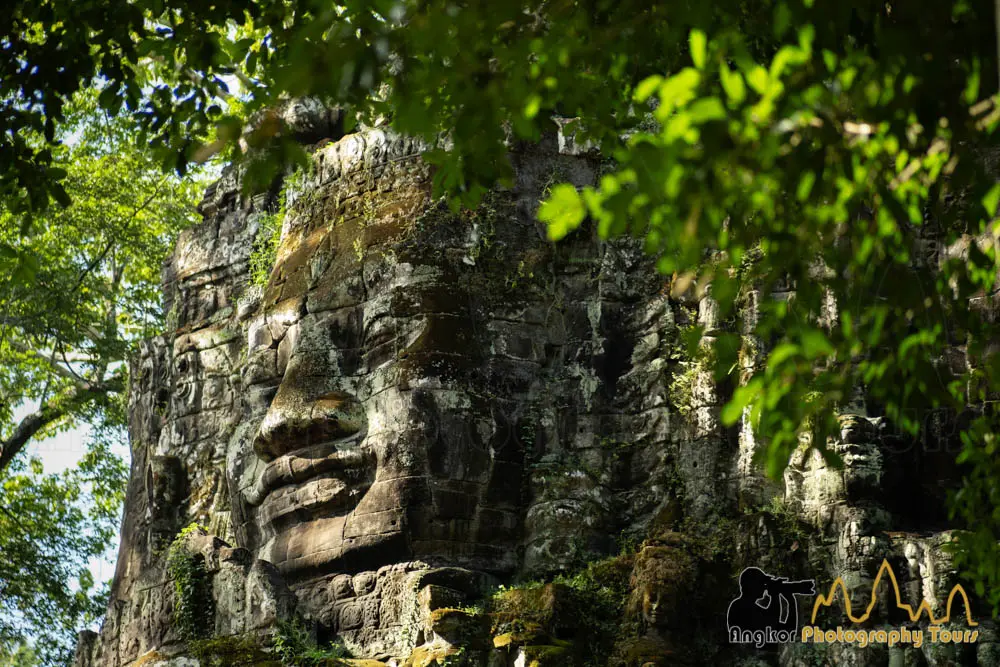 Massive carved face at the South Gate of Angkor Thom